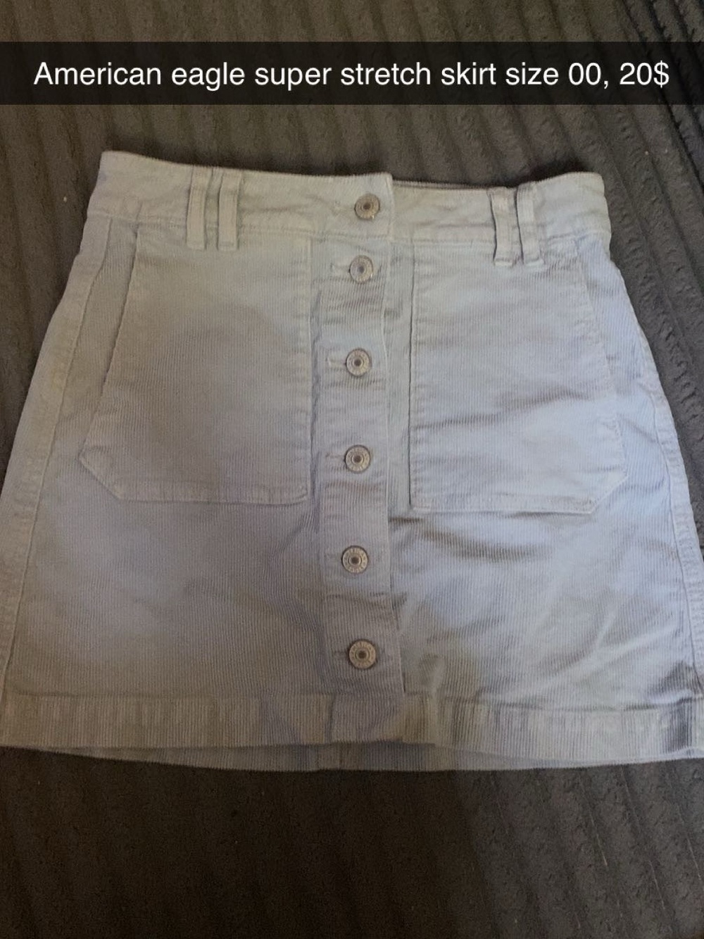American Eagle Outfitters light washed Button-Front Mini Skirt